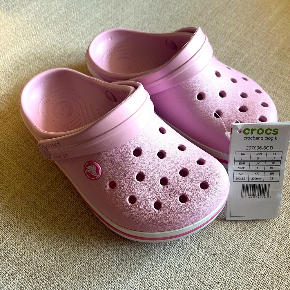 Light pink crocs.